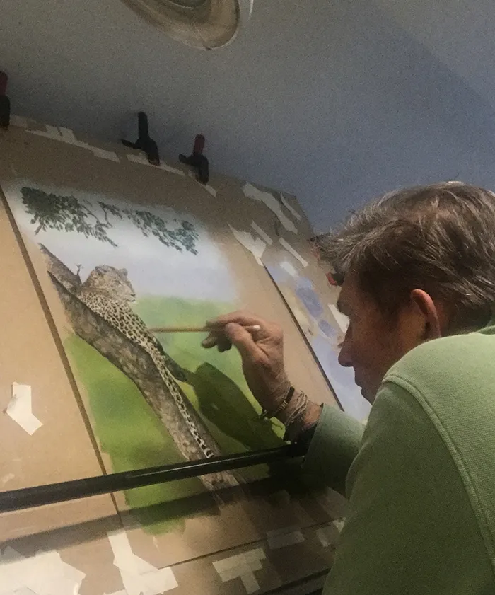 Simon working on a leopard resting, titled 'Just hanging around"